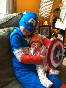 Captain America (Brecken) holding Gretchen