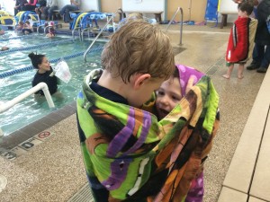 Brecken telling Madiana how good she did at swimming