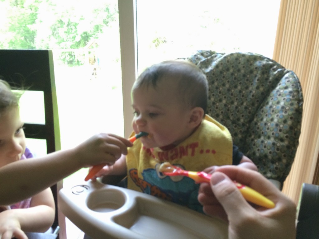 Madiana helping feed Gretchen.