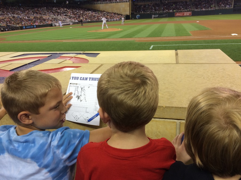 Michael , Brecken and Julia chatting about the game so far.