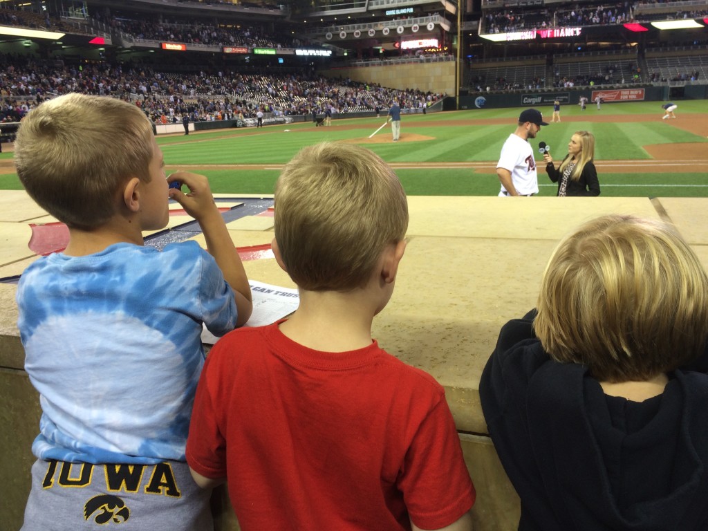 Michael, Brecken, and Julia watching the post-game interview.