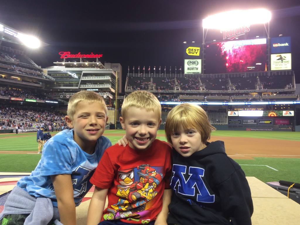 Michael, Brecken, and Julia after the Twins win!